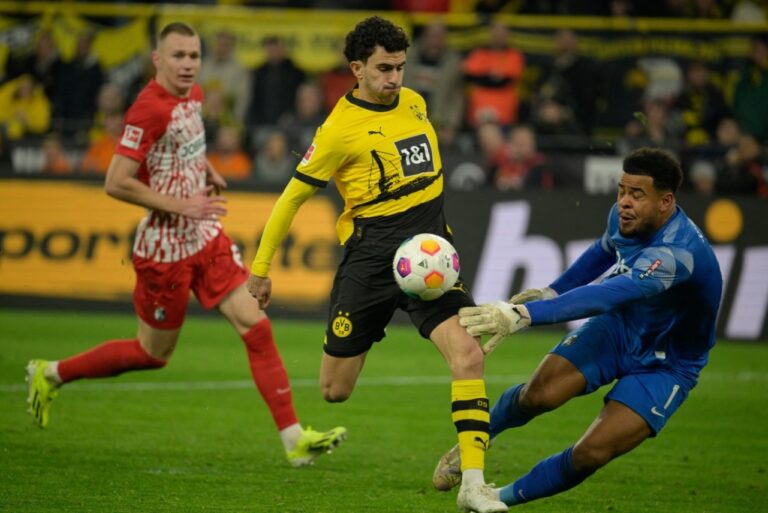 <p>O Borussia Dortmund está em 3º lugar na Bundesliga. Foto: SASCHA SCHUERMANN/AFP</p>
