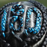 As tranças de Byanca Brasil com o número do 180. Foto: Gustavo Martins/Cruzeiro