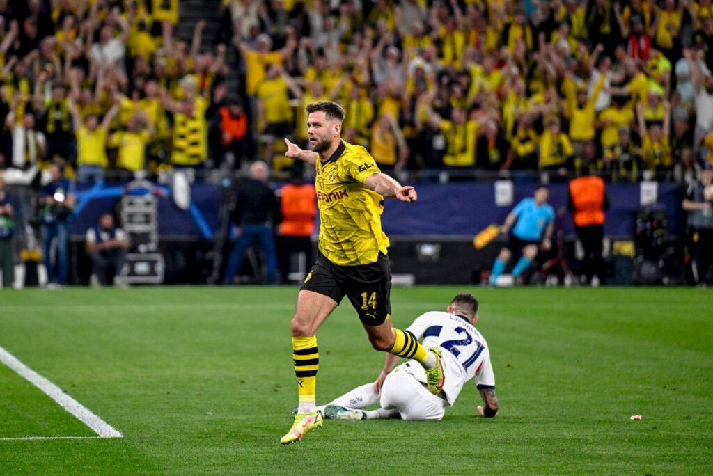 Atacante Niclas Füllkrug comemora gol pelo Borussia Dortmund contra o PSG em 2024
