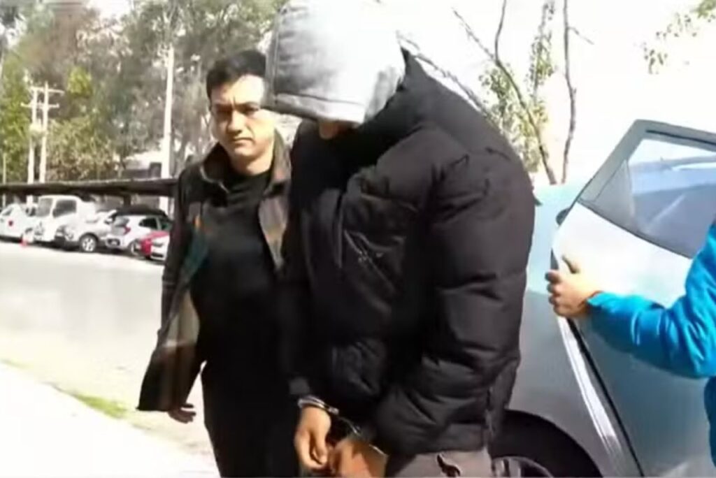 Momento em que um dos nove jogadores é preso no Chile