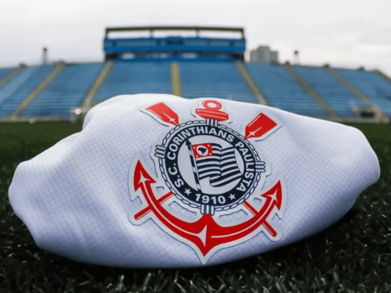 <p>Torcida do Corinthians em Londres demonstra apoio à quitação da Arena.</p>